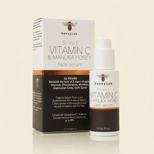HoneyLab Vitamin C Face Serum with Hyaluronic Acid Manuka Honey and peptides. Anti-aging serum contains Marine extracts that soften the look of dark spots wrinkles and fine lines. 2oz bottle.
